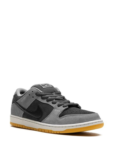 Nike Dunk Low grey and black sneaker with gum sole, side view