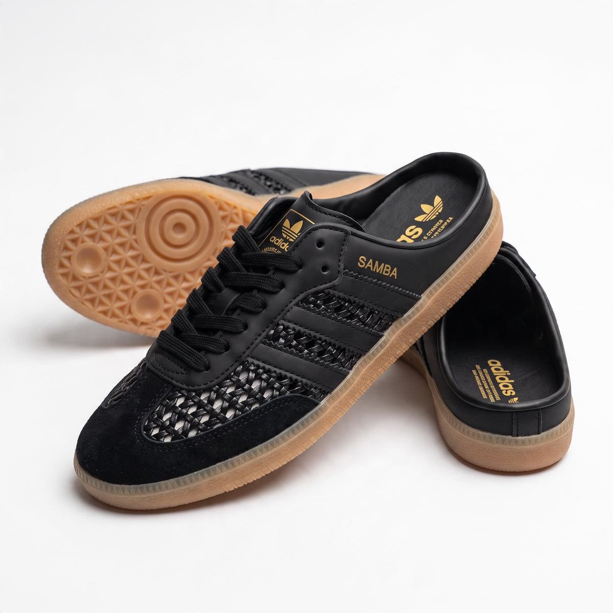 Black Adidas Samba sneakers with woven upper and gum sole
