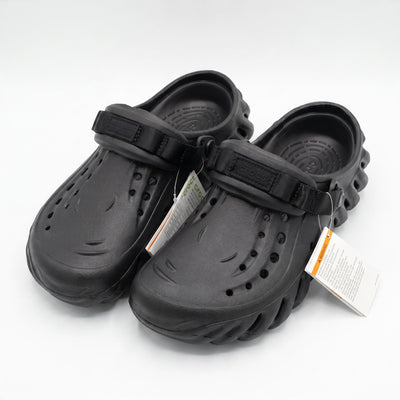 black Crocs clogs with adjustable strap and ventilated upper