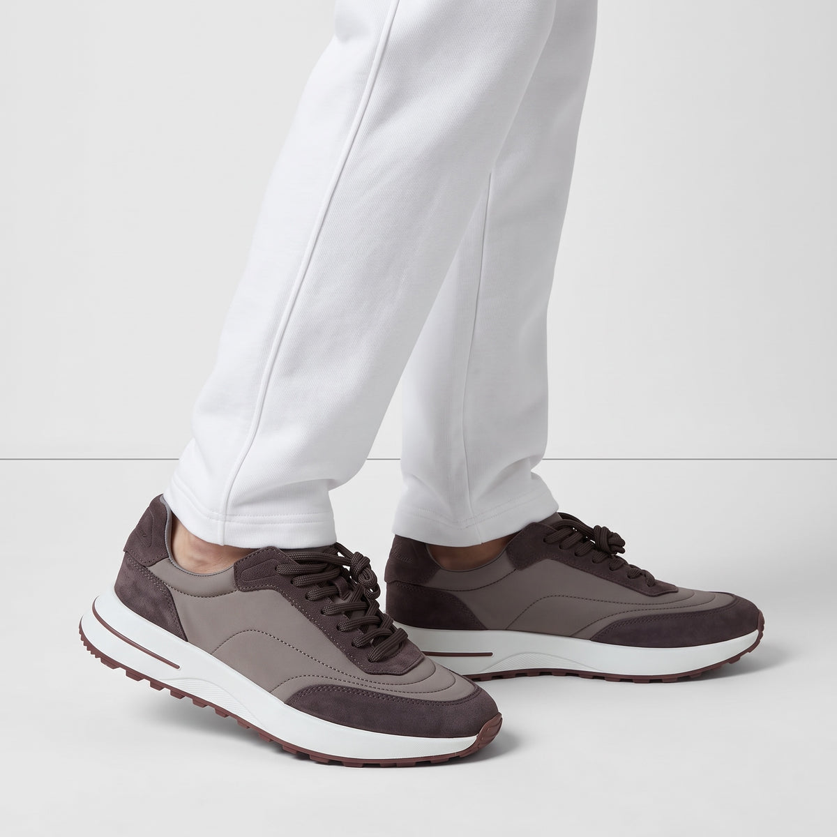 Loro Piana low-top brown trainers with layered upper and white platform sole