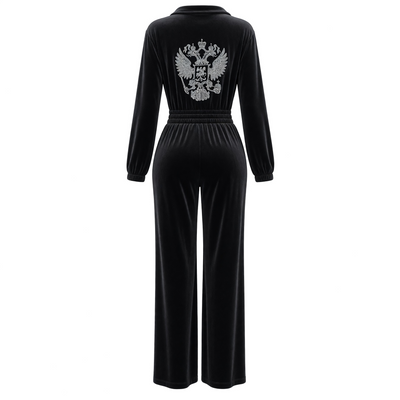 black velvet jumpsuit with half zip, elastic waist and embroidered crest on chest and back