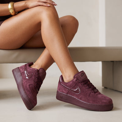 Nike Air Force 1 Low maroon suede sneakers with glossy swoosh