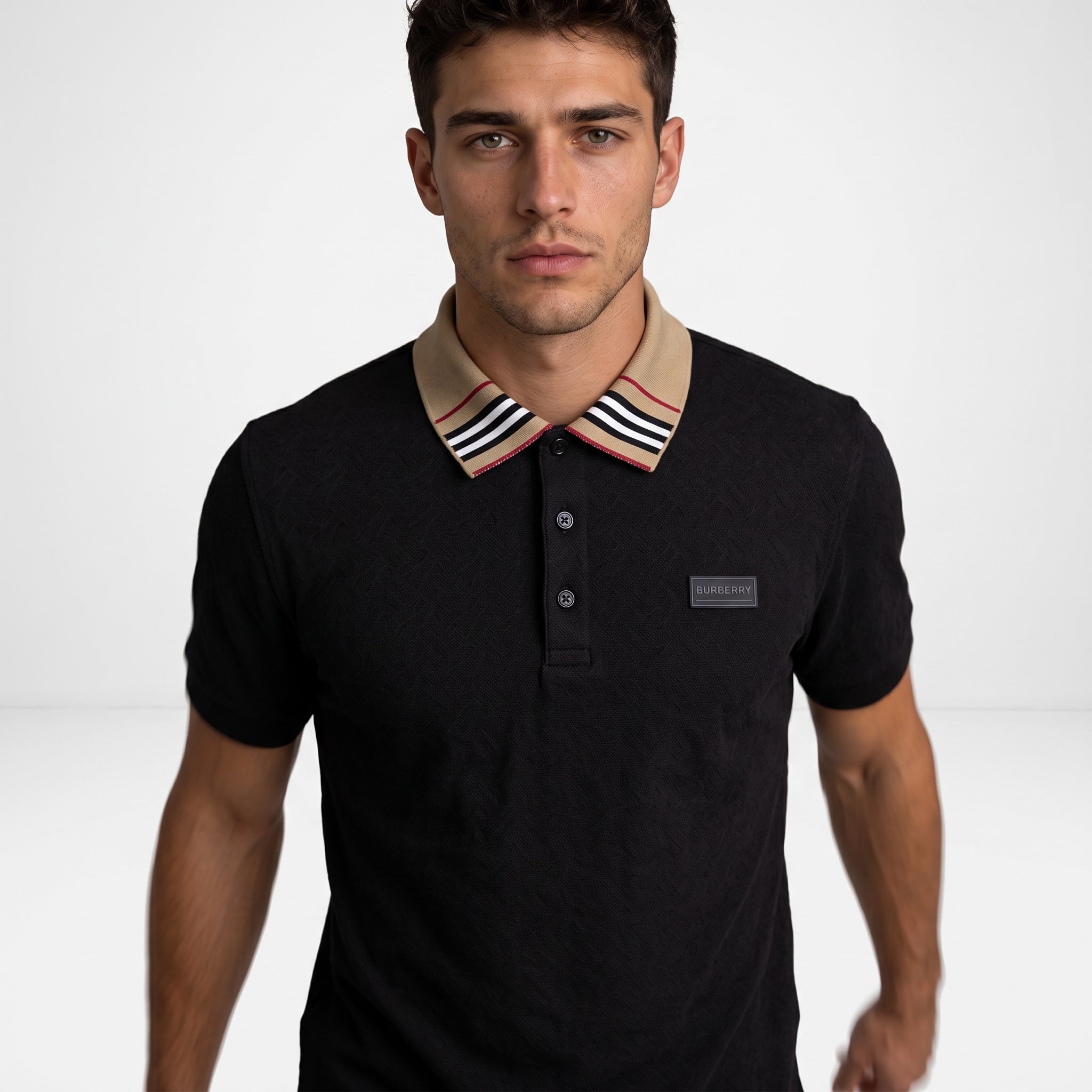 Black Burberry polo with beige striped collar and logo patch