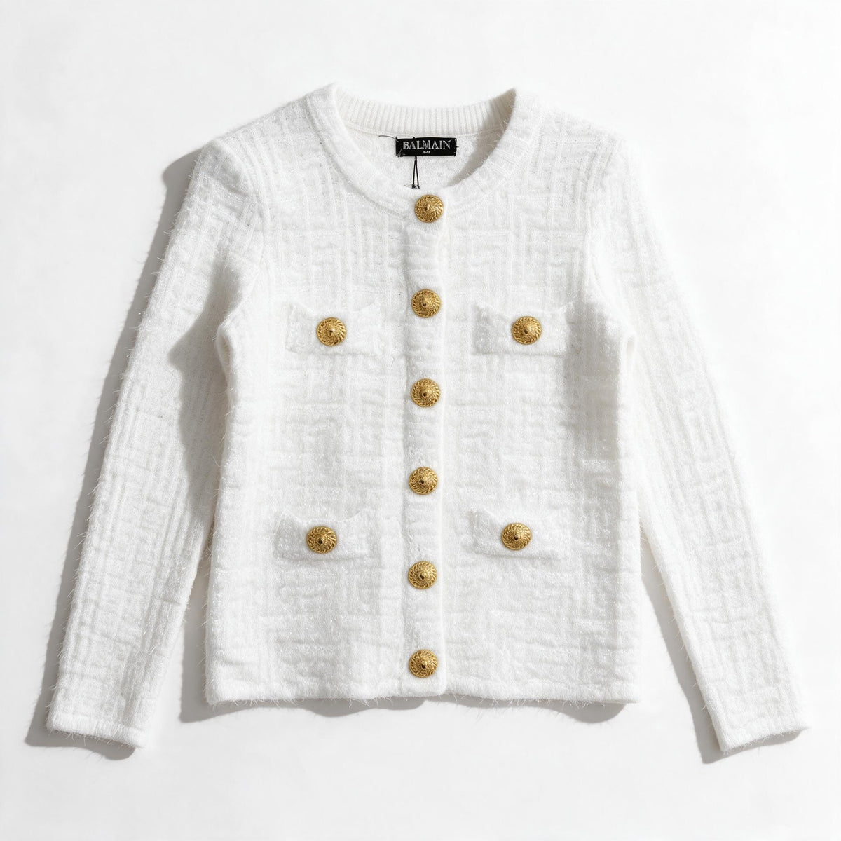 White Balmain tweed jacket with gold buttons and patch pockets