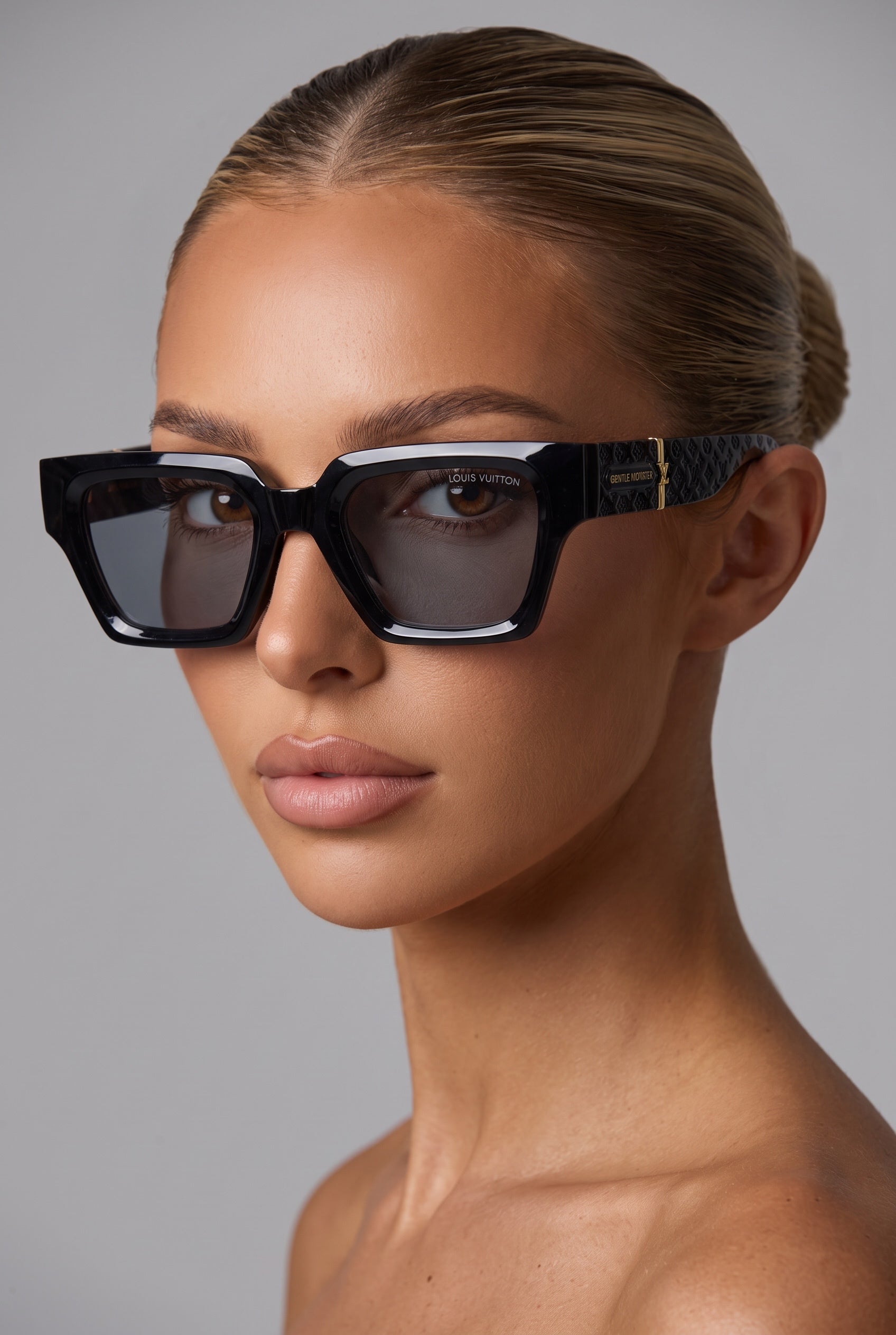 Black square Louis Vuitton sunglasses with monogram temples and gold plaque