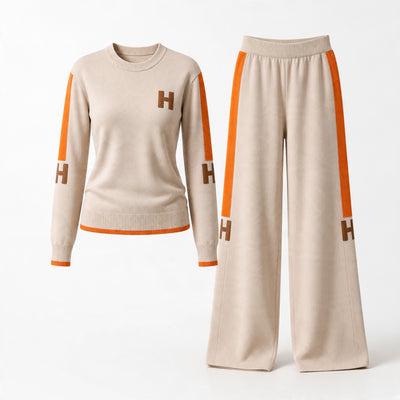 Beige knit two-piece tracksuit with orange side stripes and H logo patches