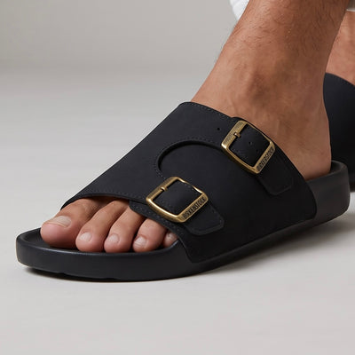 Black Birkenstock Arizona double-buckle slide sandal on model foot