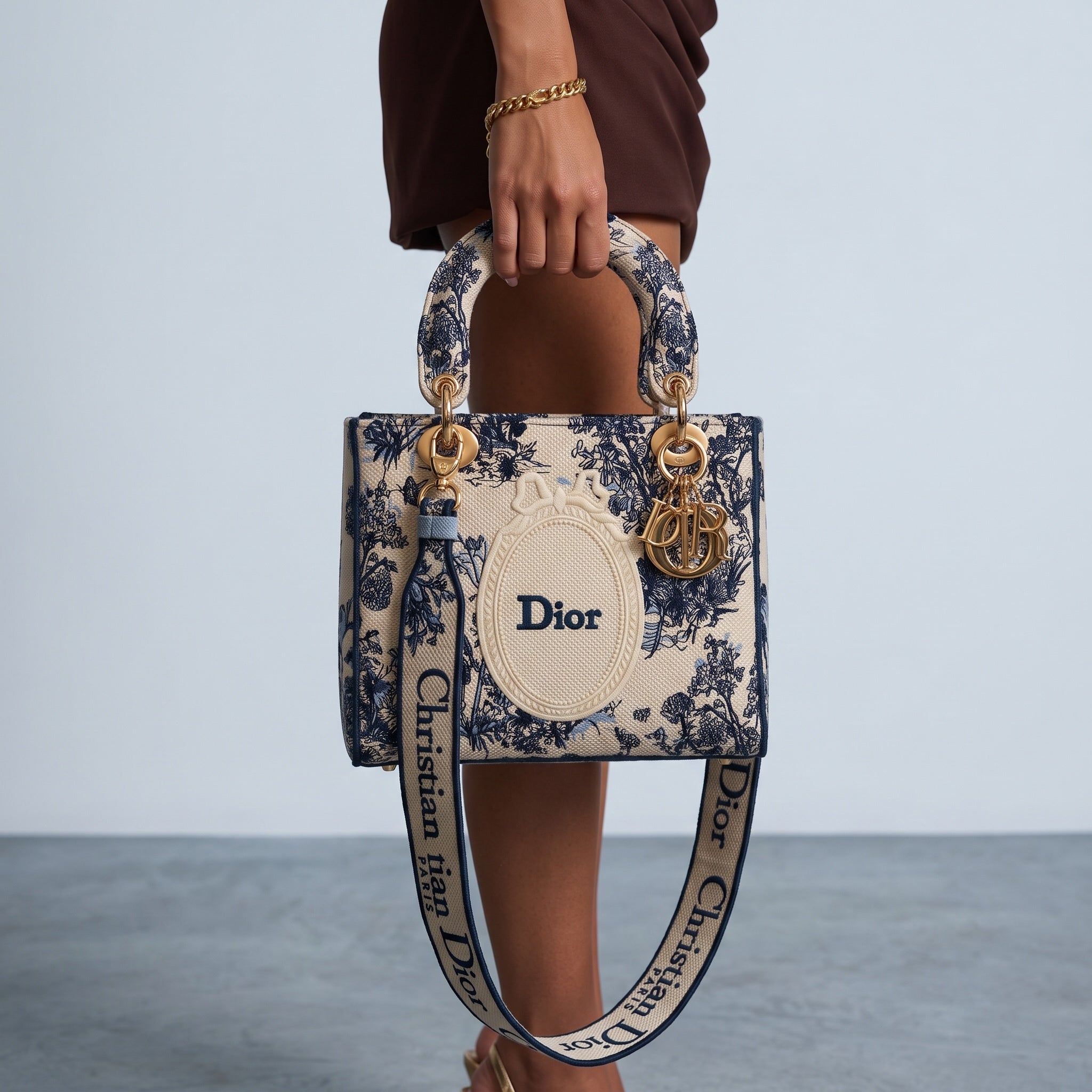 Dior Lady Dior tote in blue toile de jouy canvas with gold hardware and Dior charms