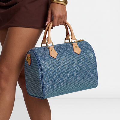 Blue Louis Vuitton monogram top-handle bag with crystal-like embellishment and beige handles