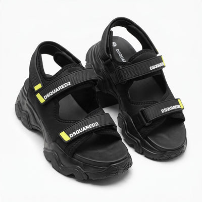 Black DSQUARED2 chunky sandals with Velcro straps and neon yellow accents