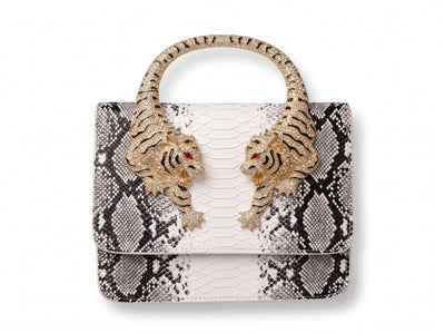 Black and white python-print top-handle bag with gold crystal tiger-head handle