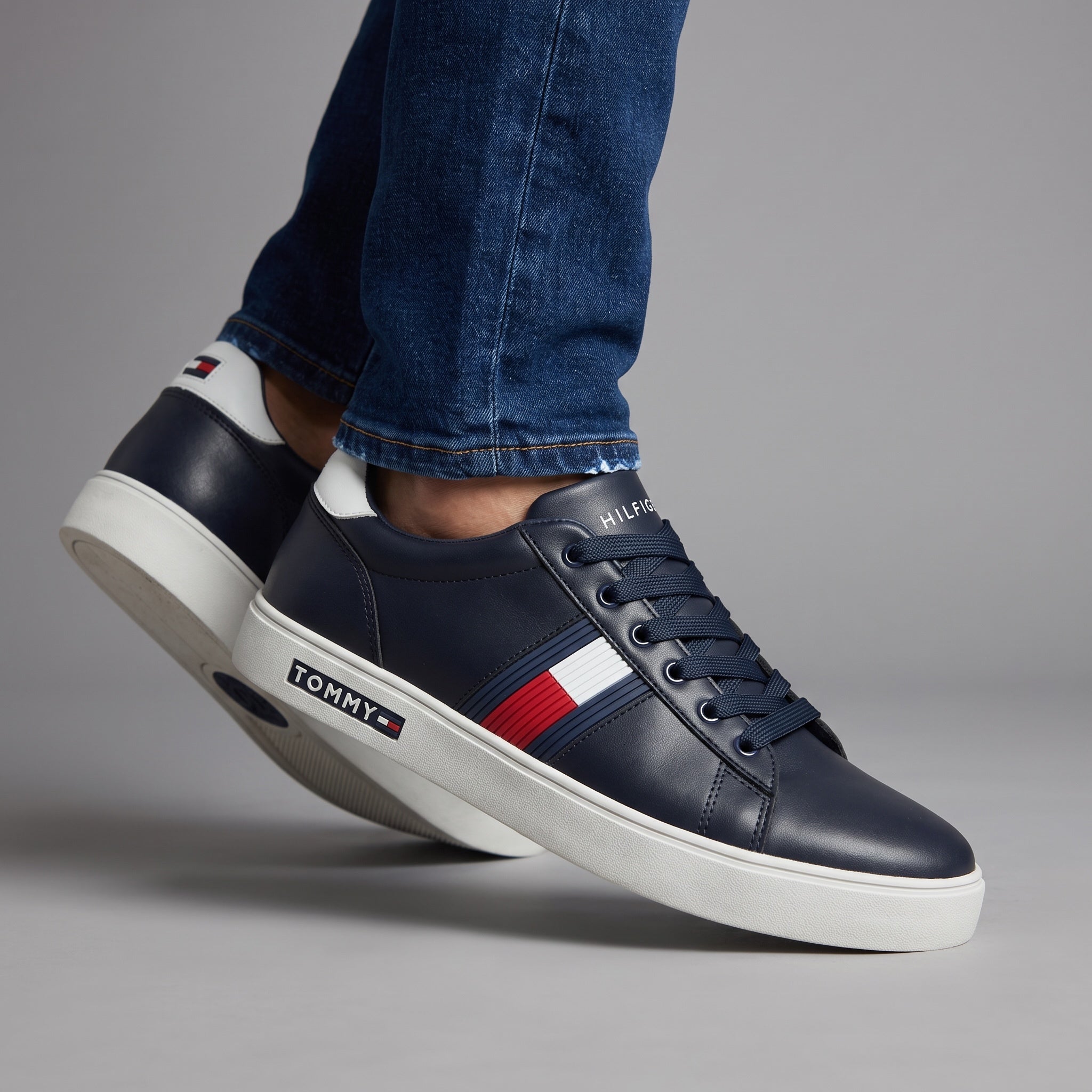 Tommy Hilfiger navy low-top sneakers with red white blue stripe and white sole