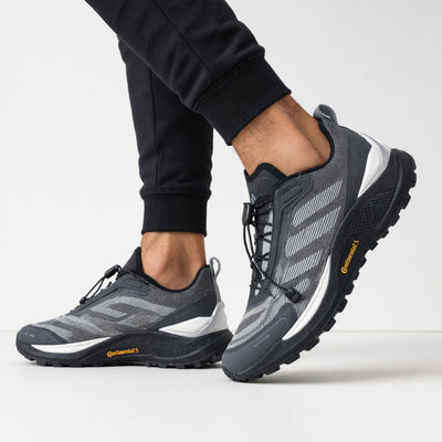 grey adidas trail sneaker with Continental outsole and toggle lacing