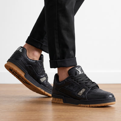 Black Louis Vuitton low-top trainer with gum sole and textured upper