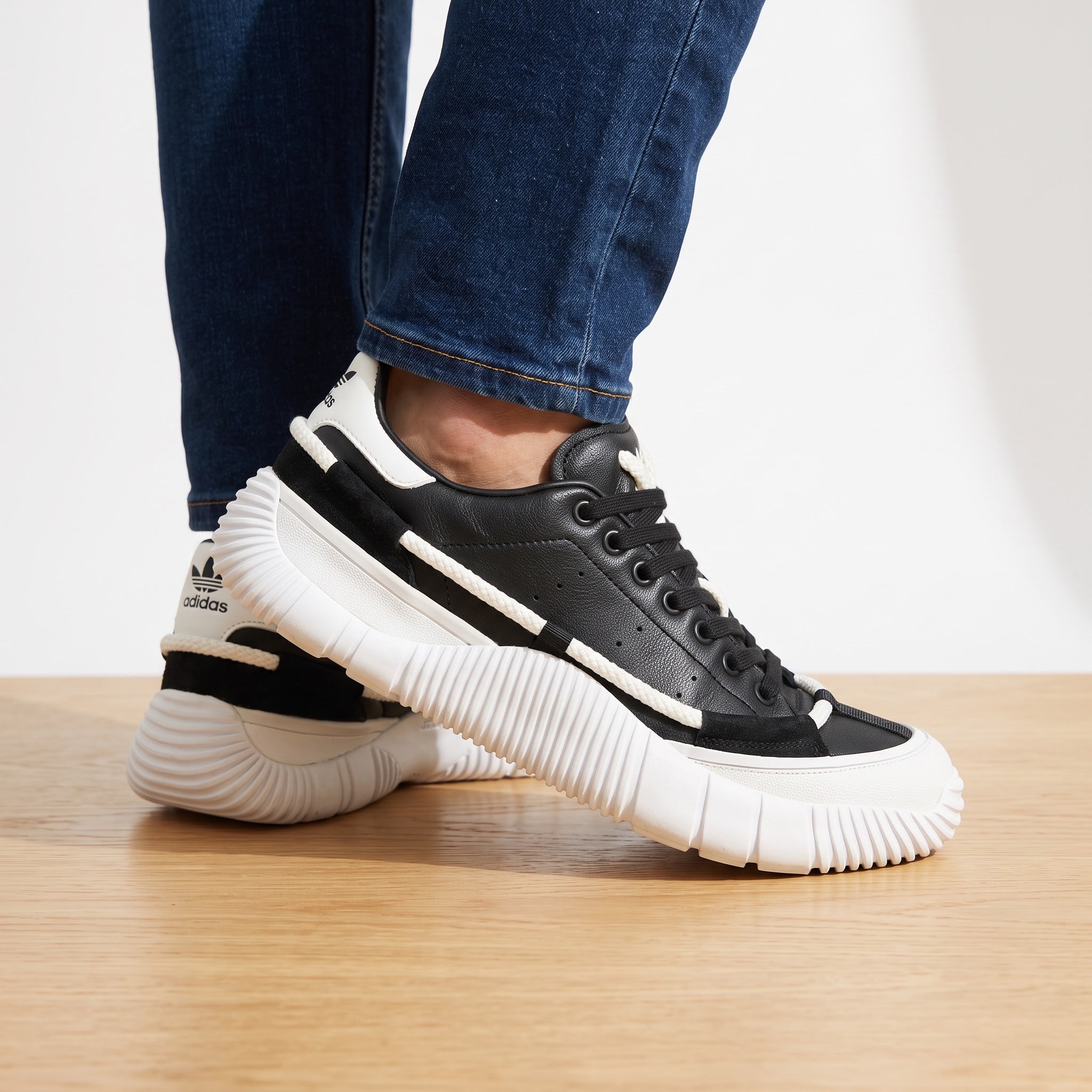 black and white Craig Green adidas low-top sneakers with rope detailing and ridged sole
