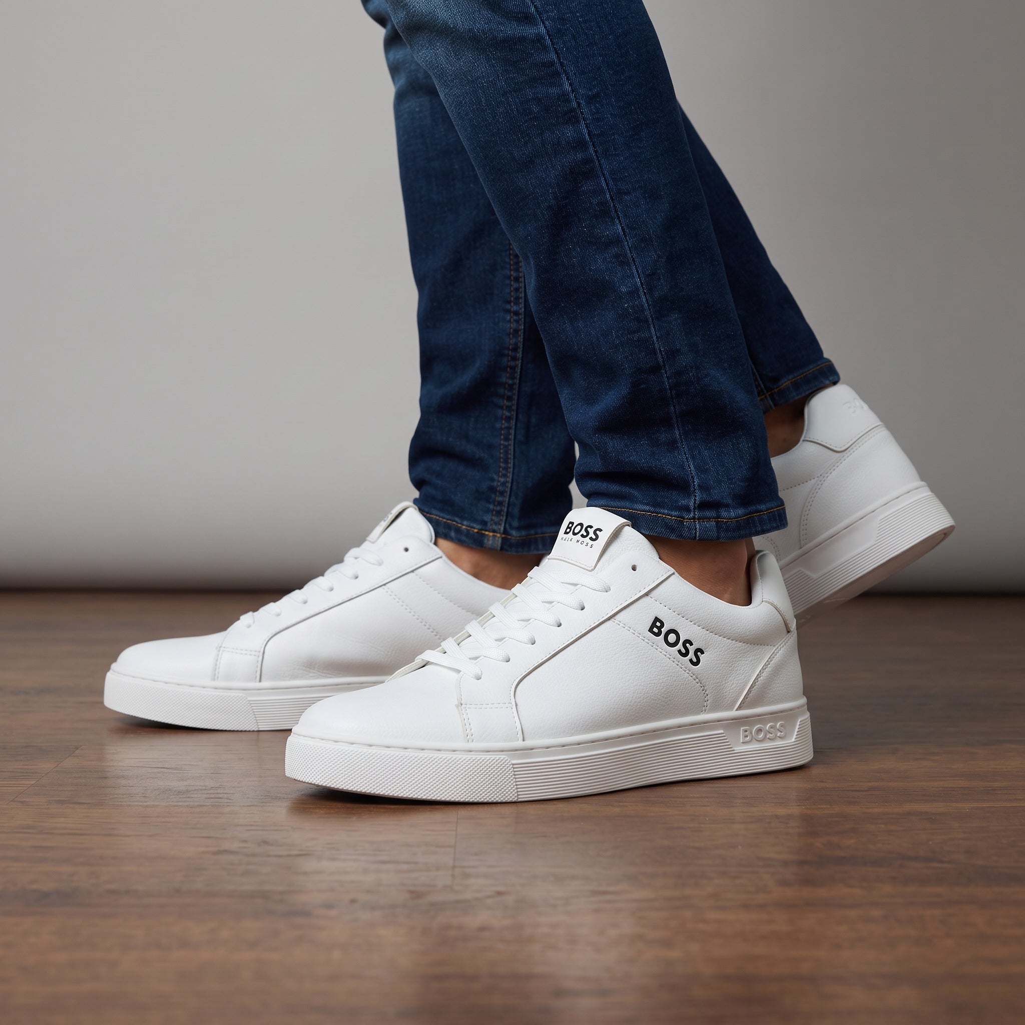 White BOSS low-top sneakers on model