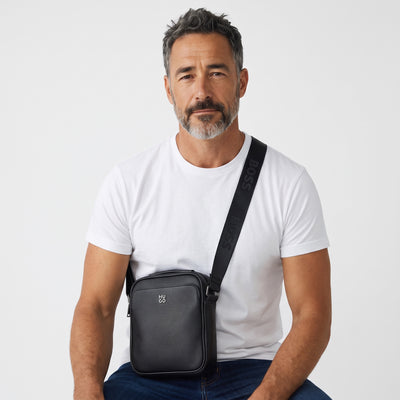 HUGO black pebbled crossbody bag with embossed strap and dual zip pockets