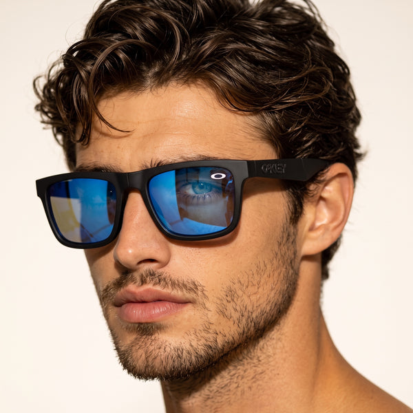 Oakley Sunglasses – Matte Black with Blue Lens 😎