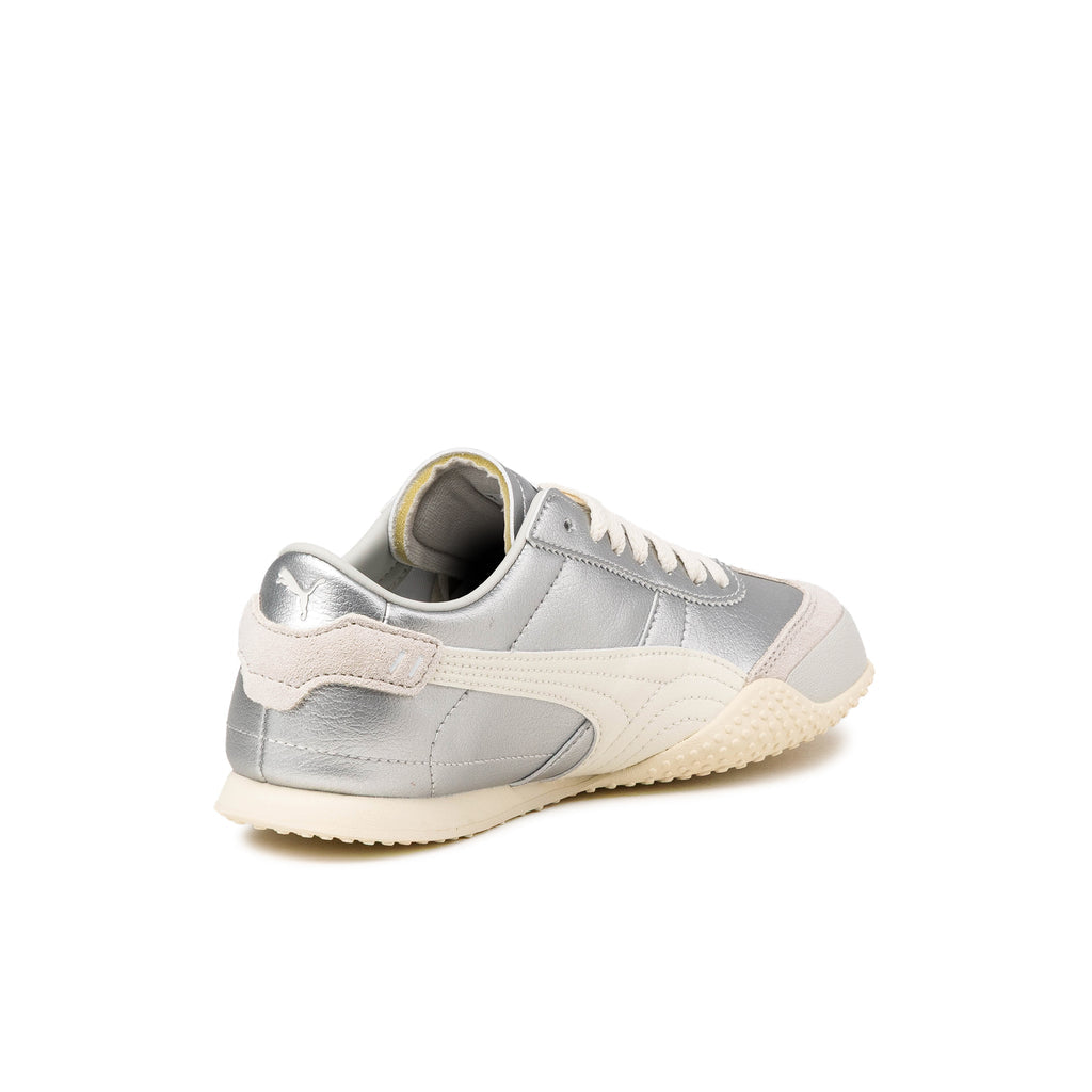 Puma low-profile silver metallic trainer with cream formstrip and textured off-white sole