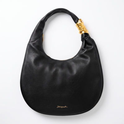 Black Schiaparelli crescent hobo shoulder bag with gold sculptural clasp