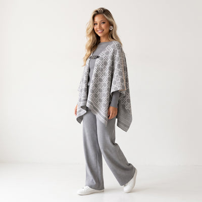 Grey geometric patterned cape with front buckle closure
