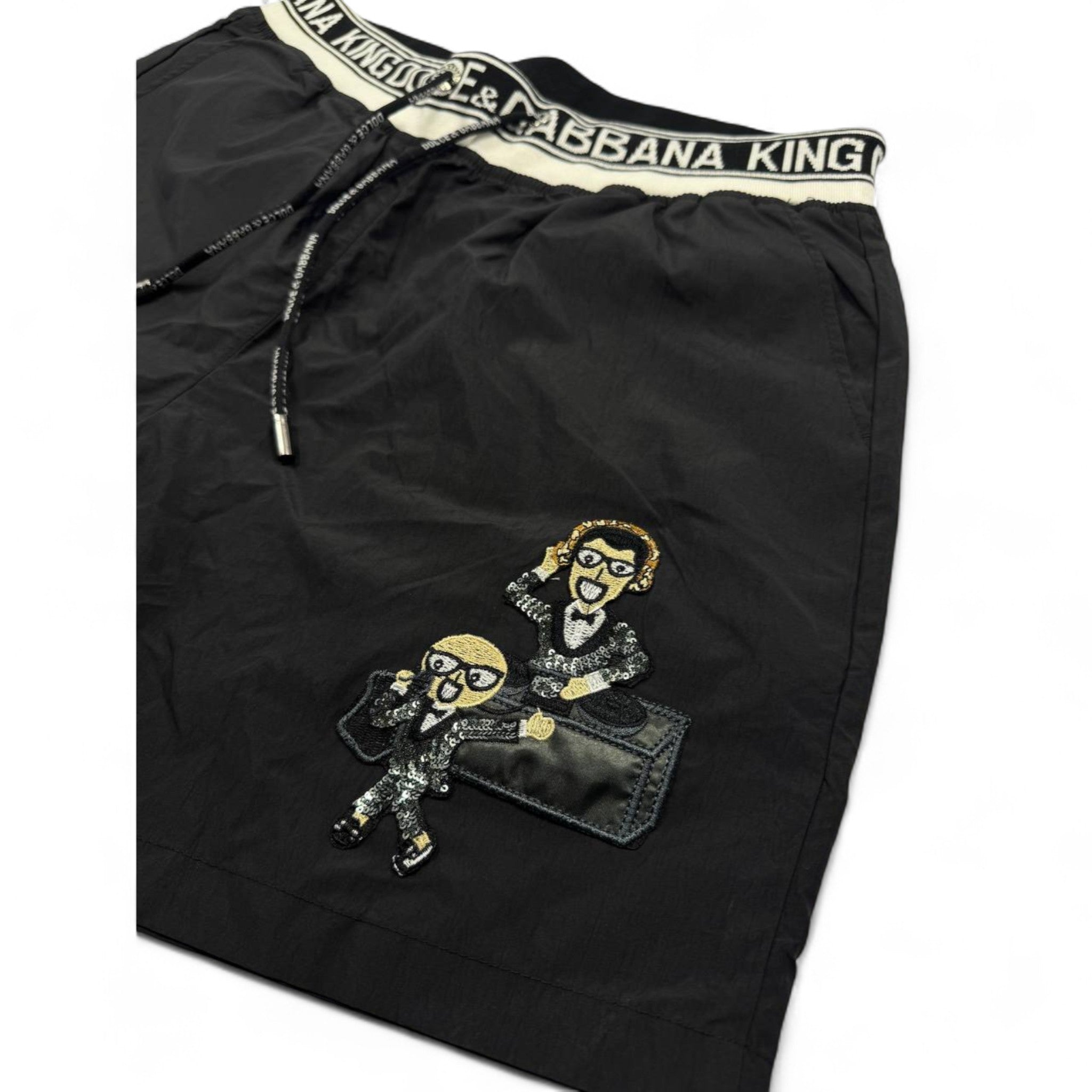 Dolce & Gabbana King Cartoon Black Swim Shorts – Iconic Designer Edition