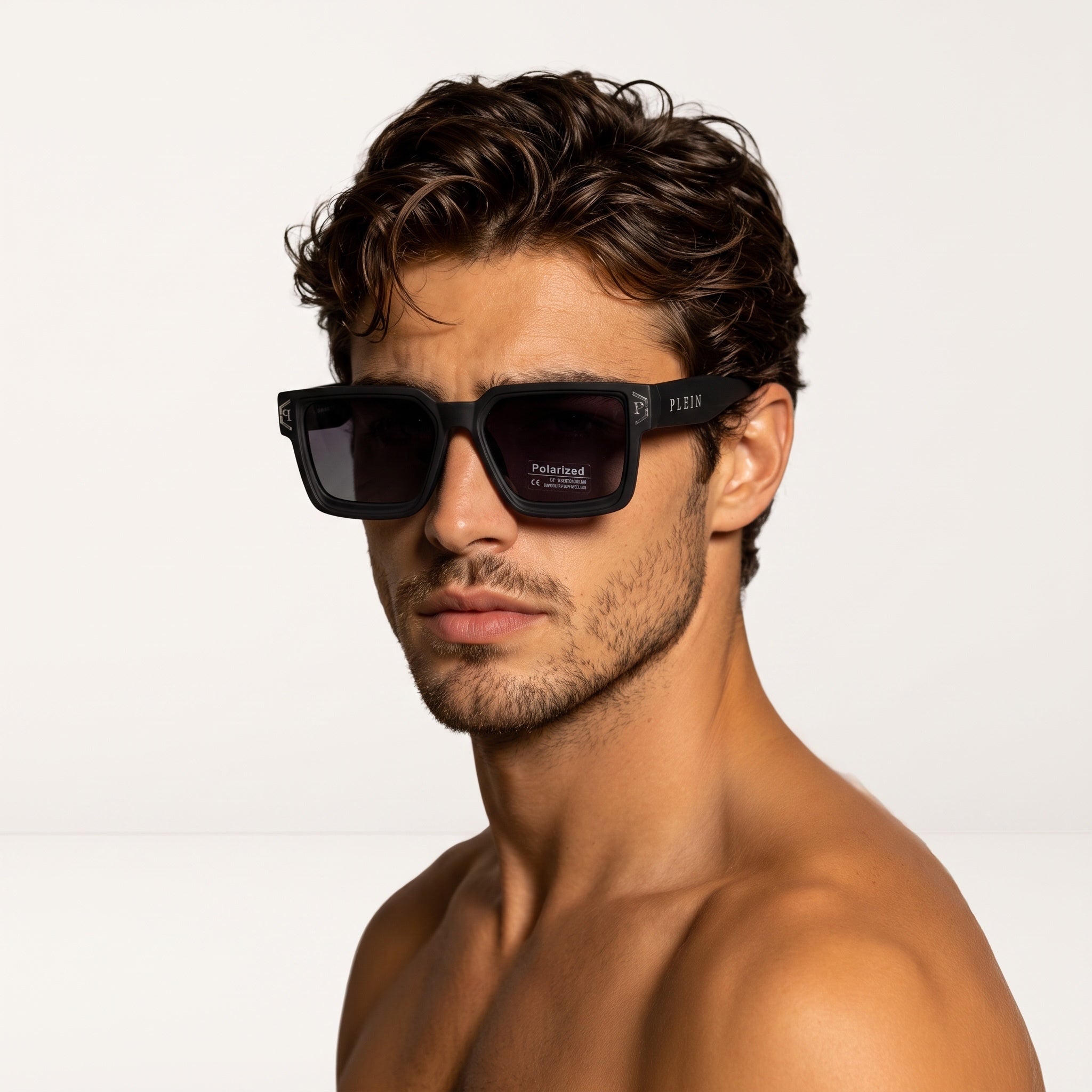 Philipp Plein matte black oversized rectangular sunglasses with dark polarized lenses