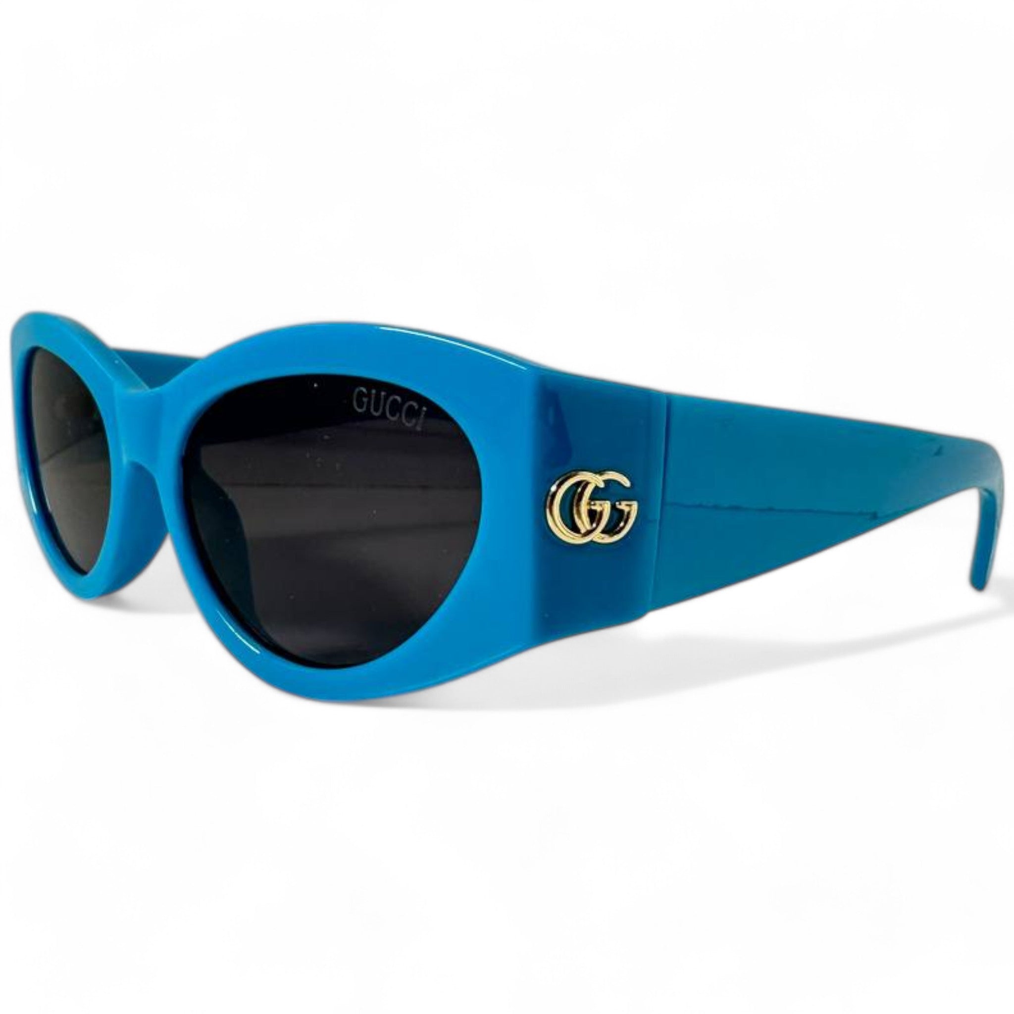 Gucci Blue Oval Sunglasses with Gold GG Logo
