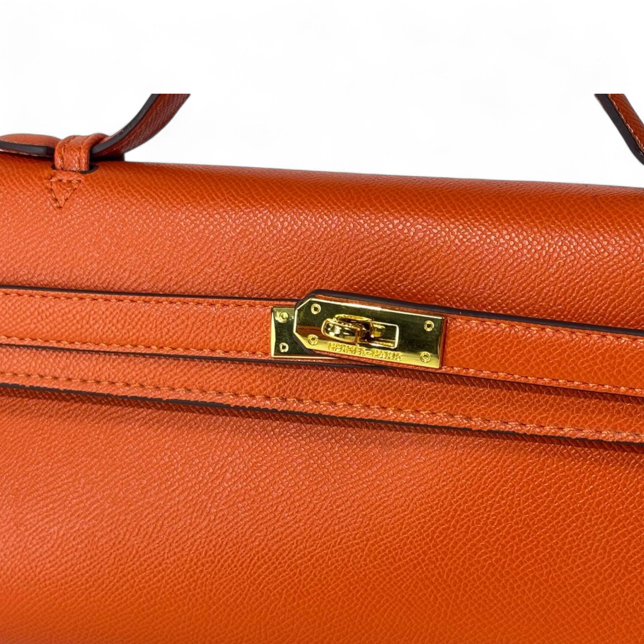 Hermès Kelly To Go Clutch – Orange Epsom Leather with Gold Hardware 🧡✨