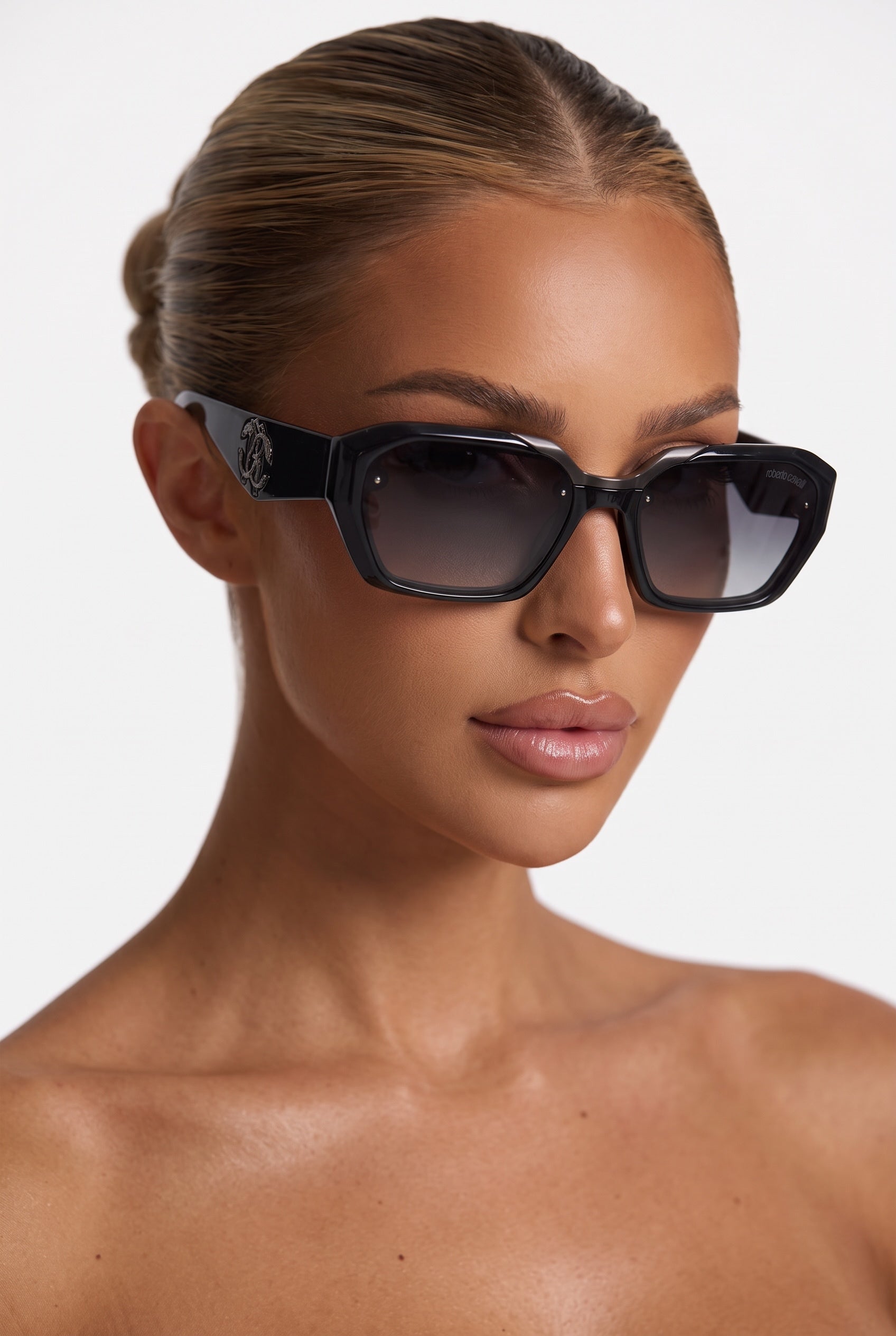 Roberto Cavalli black geometric sunglasses with gradient lenses and logo detail on temple