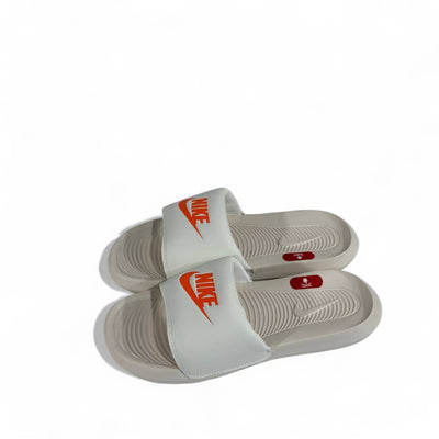 Nike Tech White & Orange Slides – Fresh Comfort & Sporty Style