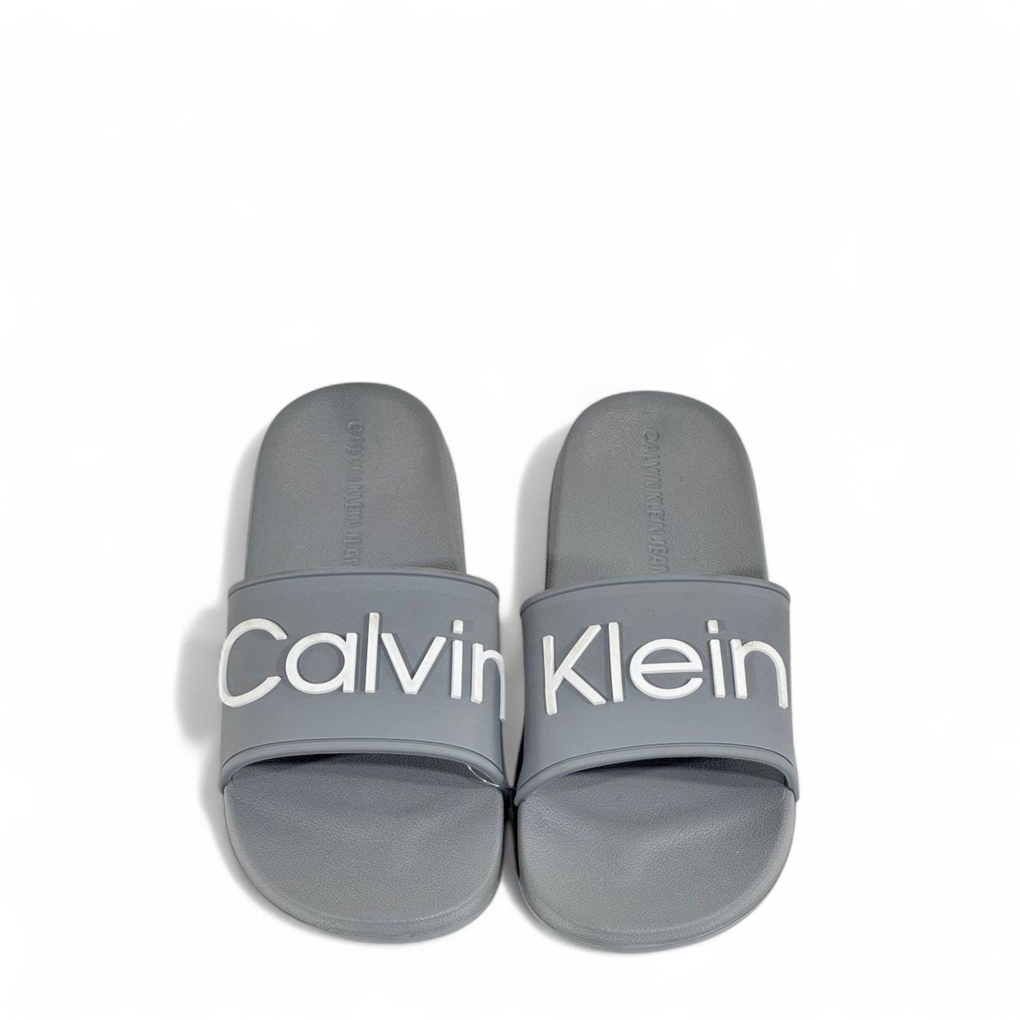 ⚪ Calvin Klein Grey Slides | Minimalist Comfort & Modern Style