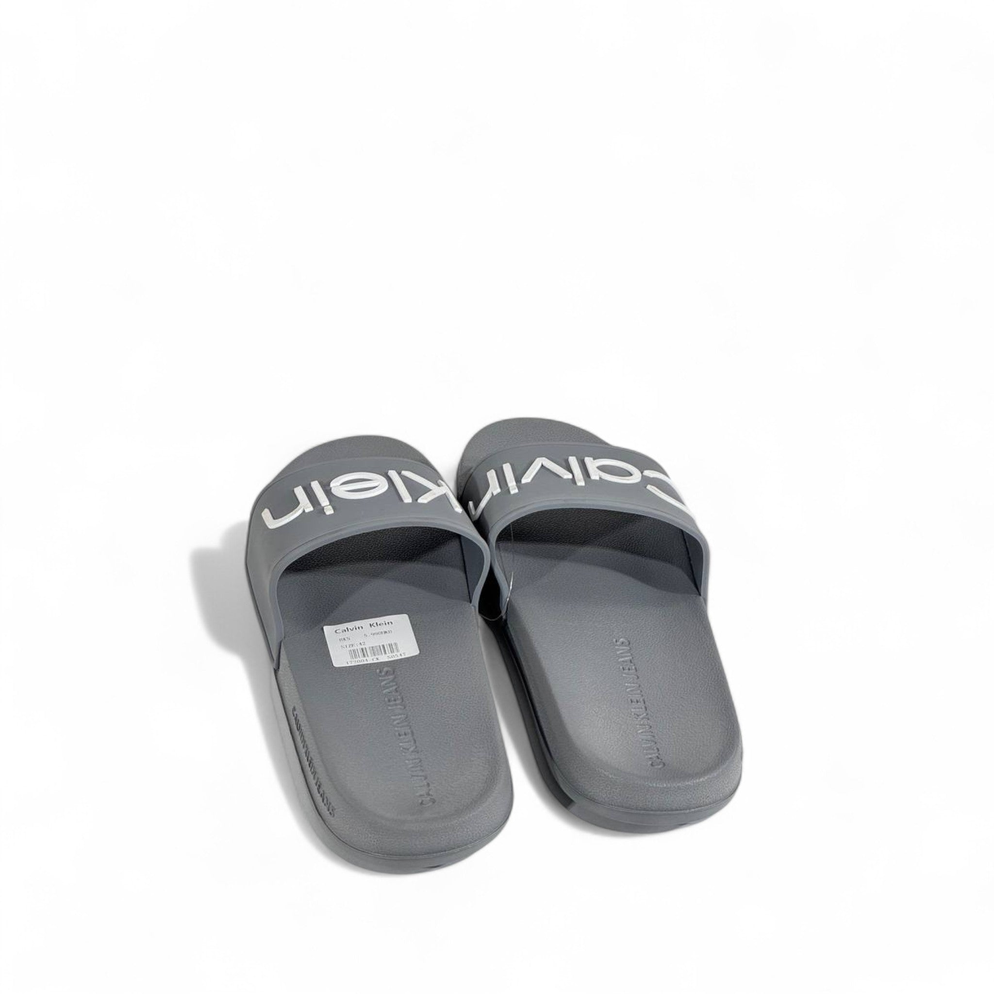 ⚪ Calvin Klein Grey Slides | Minimalist Comfort & Modern Style