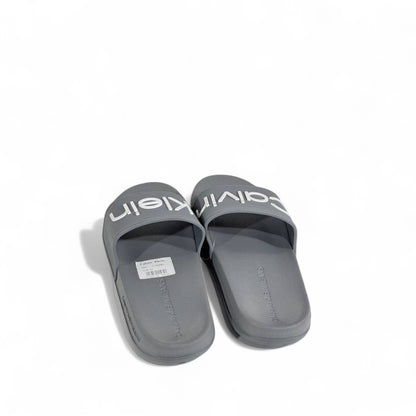 ⚪ Calvin Klein Grey Slides | Minimalist Comfort & Modern Style