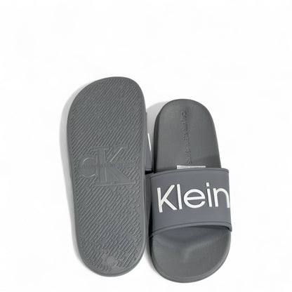 ⚪ Calvin Klein Grey Slides | Minimalist Comfort & Modern Style