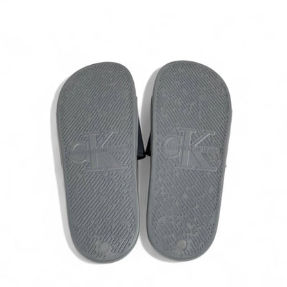 ⚪ Calvin Klein Grey Slides | Minimalist Comfort & Modern Style