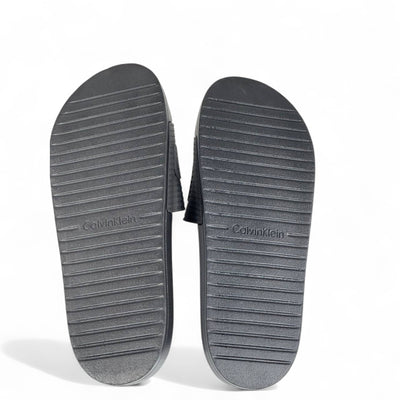 Calvin Klein Jeans Triple Black Slides – Minimalist Comfort & Modern Style