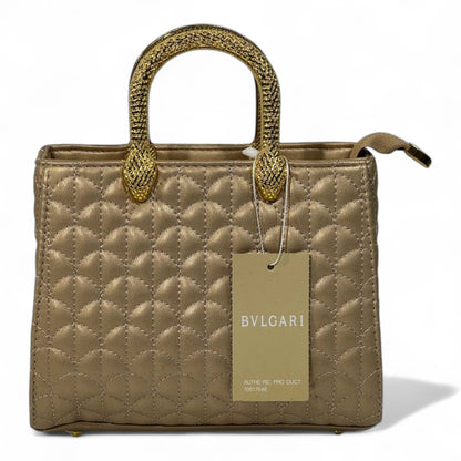 BVLGARI Gold Quilted Handbag with Serpent Handles – Luxury Royal Edition ✨💛