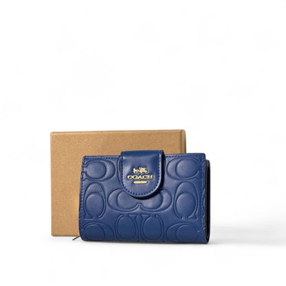 Coach Signature Embossed Leather Wallet – Navy Elegance 💙