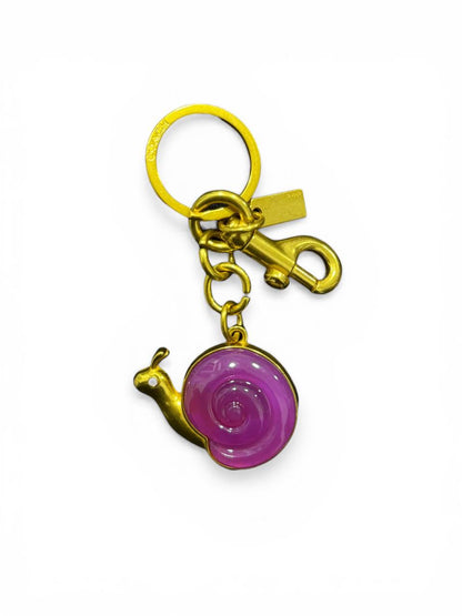 🐌 COACH Snail Bag Charm Keychain – Playful Luxury Designer Accessory ✨