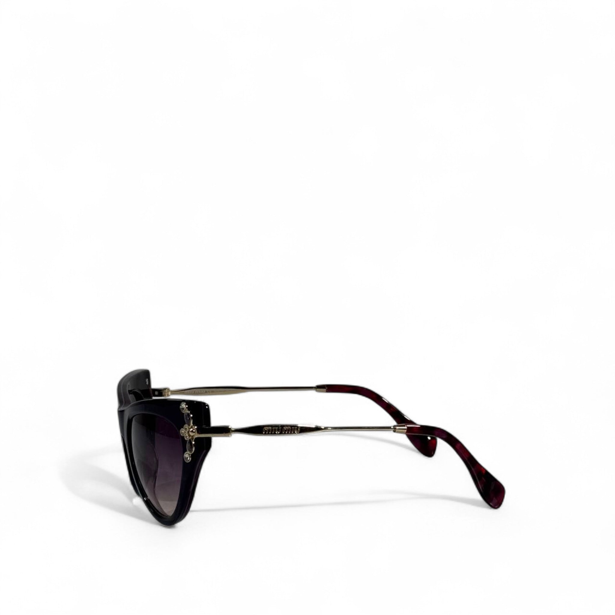 ✨ Miu Miu Cat-Eye Sunglasses – Dark Purple Frame with Gold Crystal Detailing 👑💎