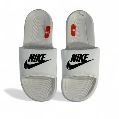 Nike White Slides – Minimalist Comfort with Iconic Style