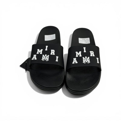AMIRI Luxury Black Slide Sandals – Bold White Logo Design & Premium Streetwear 👟✨