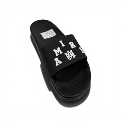 AMIRI Luxury Black Slide Sandals – Bold White Logo Design & Premium Streetwear 👟✨