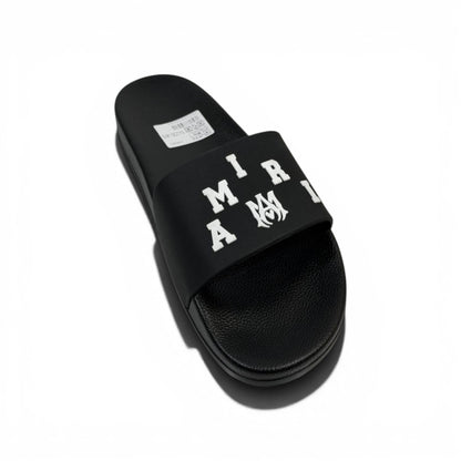 AMIRI Luxury Black Slide Sandals – Bold White Logo Design & Premium Streetwear 👟✨