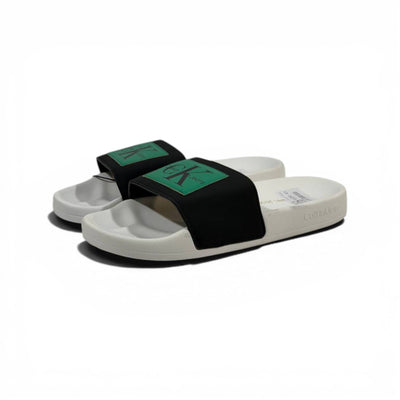 CALVIN KLEIN Luxury Black & White Slide Sandals – CK Logo Design & Everyday Comfort 👟✨