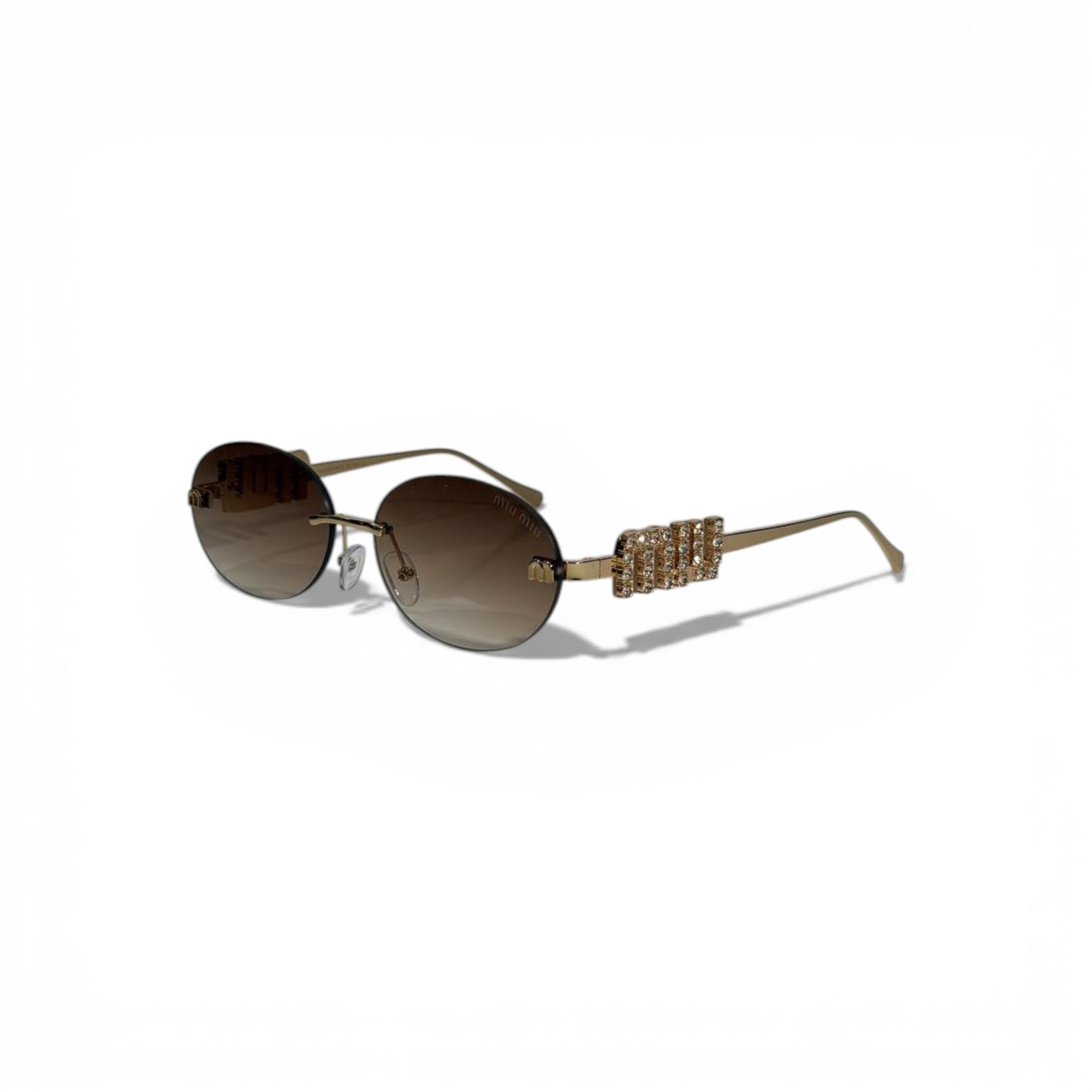🕶️ MIU MIU Oval Sunglasses – Gold Metal Frame with Crystal Temple Detail 🕶️
