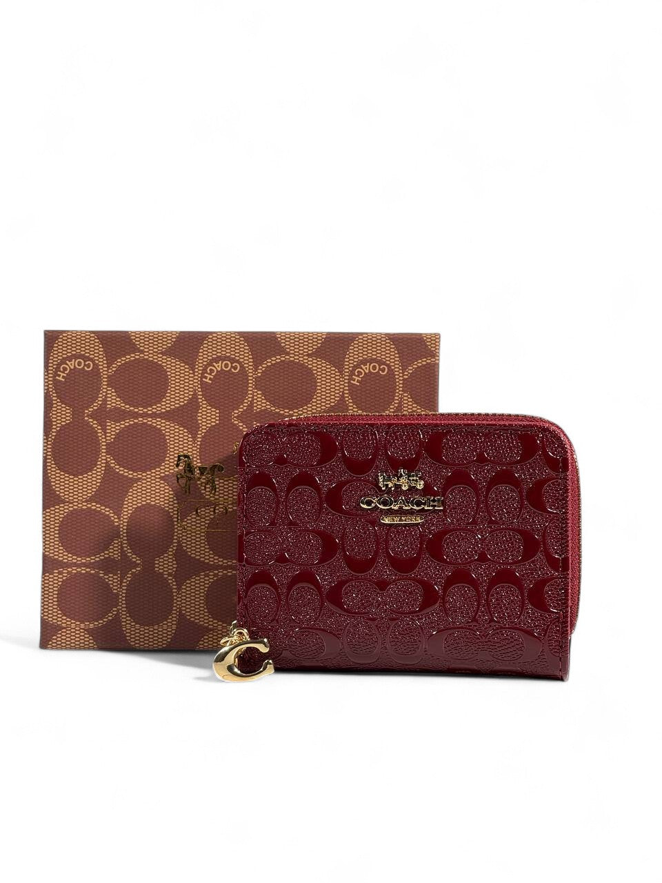 🍷 Coach Burgundy Patent Leather Zip Wallet – Embossed Signature "C"