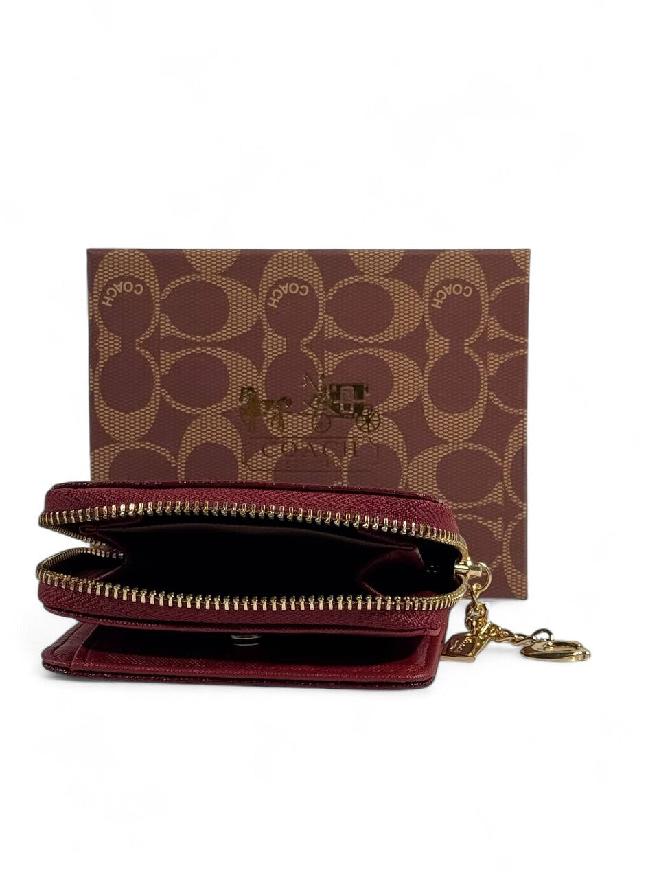 🍷 Coach Burgundy Patent Leather Zip Wallet – Embossed Signature "C"