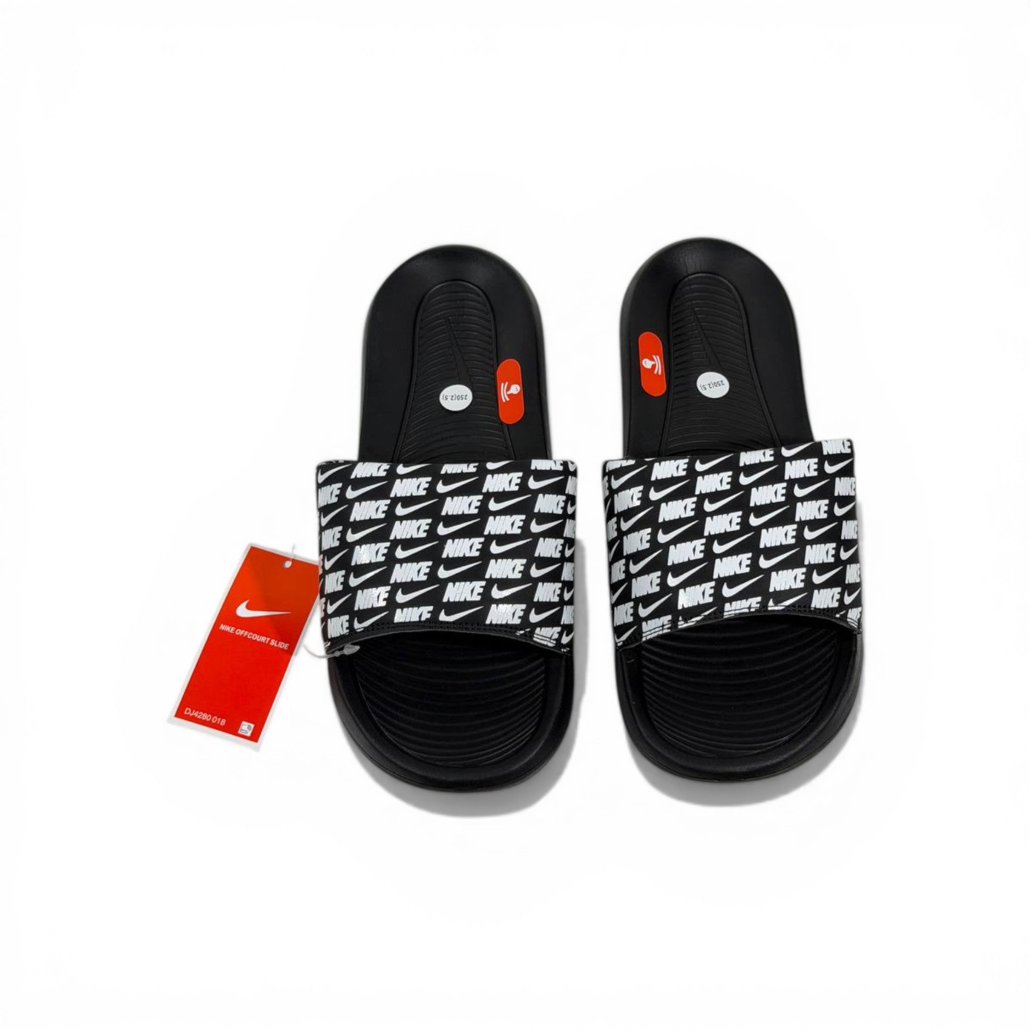 ⚫⚪ Nike All-Over Logo Slides – Streetwear Statement Edition